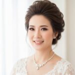 Retrato de mulher com pele impecável e radiante, evidenciando o efeito de maquiagem natural para pele oleosa e mista que controla o brilho e mantém o look fresco.